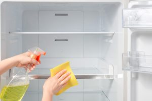 cleaning fridge